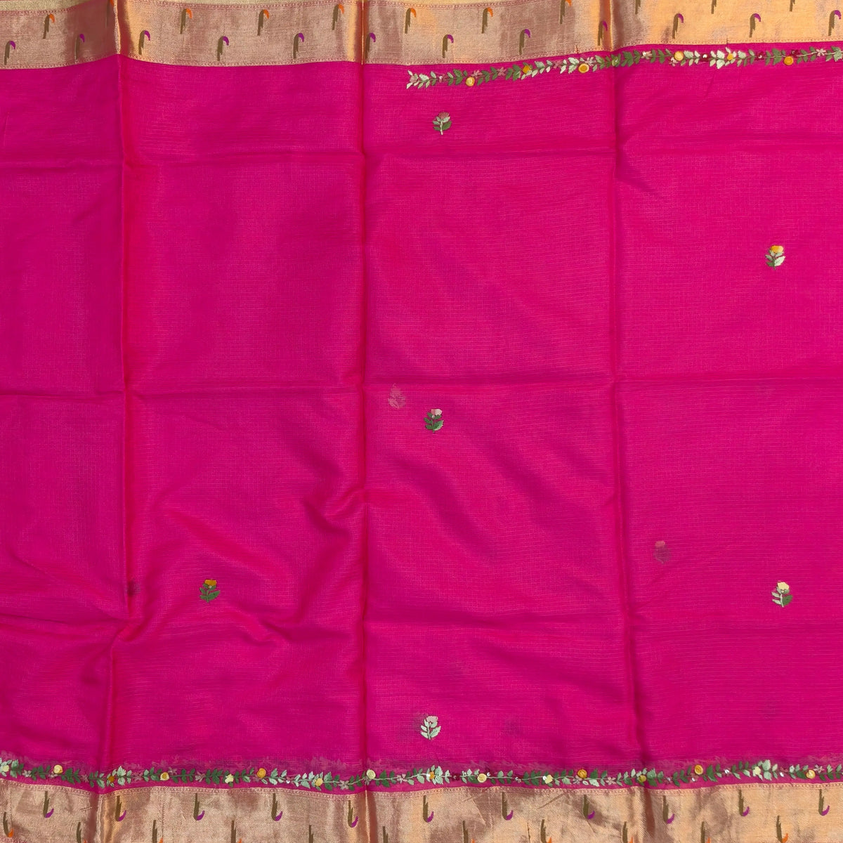 Rani pink premium kota silk saree(soft, thin)with rich hand embroidery work all over,paithani woven double side borders,rich zari woven pallu,with hand embroidery & sequins work,running blouse with embroidery and borders. NS256