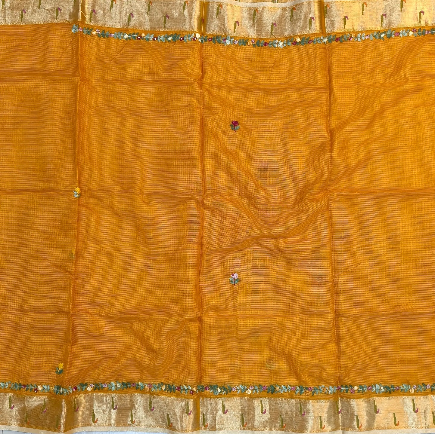 Fenugreek yellow premium kota silk saree(soft, thin)with rich hand embroidery work all over,paithani woven double side borders,rich zari woven pallu,with hand embroidery & sequins work,running blouse with embroidery and borders. NS257