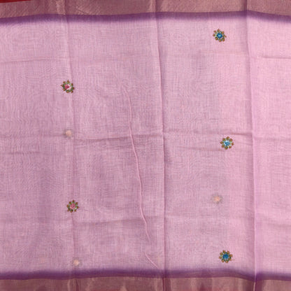 Purple with golden tint premium dual shaded tissue linen saree, with rich hand embroidery work all over(texture)double side tissue borders,contrast pallu, with rich hand embroidery and sequins work, running blouse with embroidery & borders. NS265
