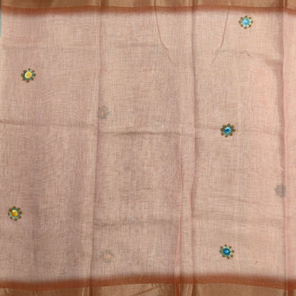 Rust orange with golden tint premium dual shaded tissue linen saree, with rich hand embroidery work all over(texture)double side tissue borders,contrast pallu, with rich hand embroidery and sequins work, running blouse with embroidery & borders. NS266