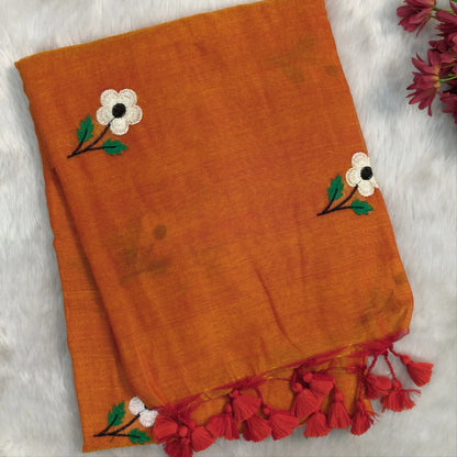 Rust orange mul mul cotton saree(soft, light weight)with embroidery all over, handmade tassles in pallu, running blouse. NS277