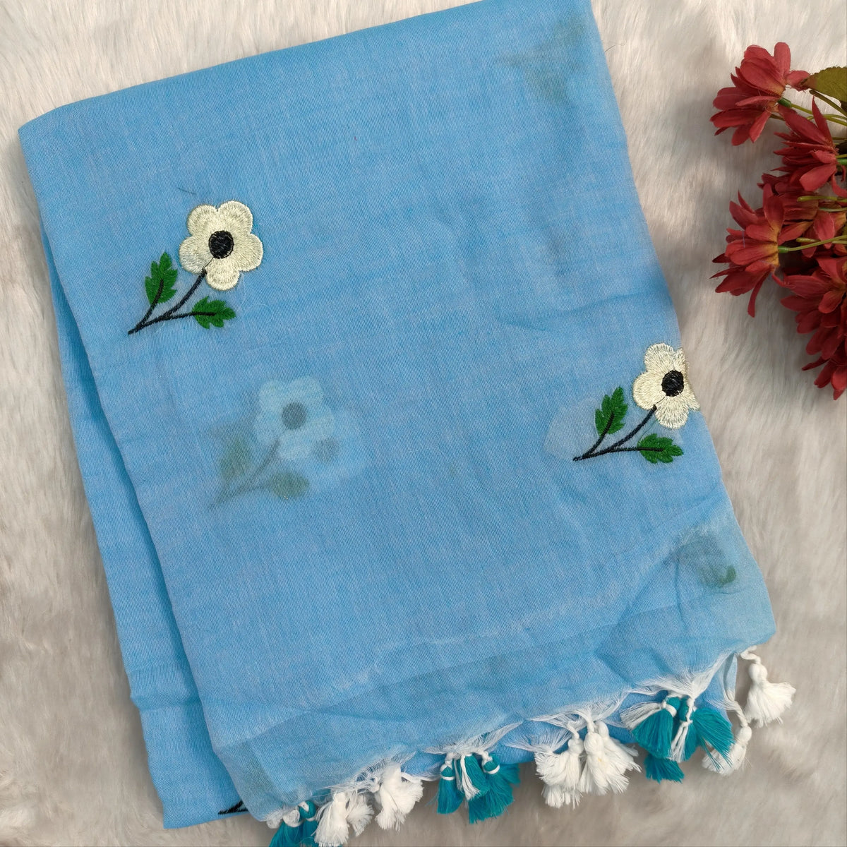 Sky blue mul mul cotton saree(soft, light weight)with embroidery all over, handmade tassles in pallu, running blouse. NS279