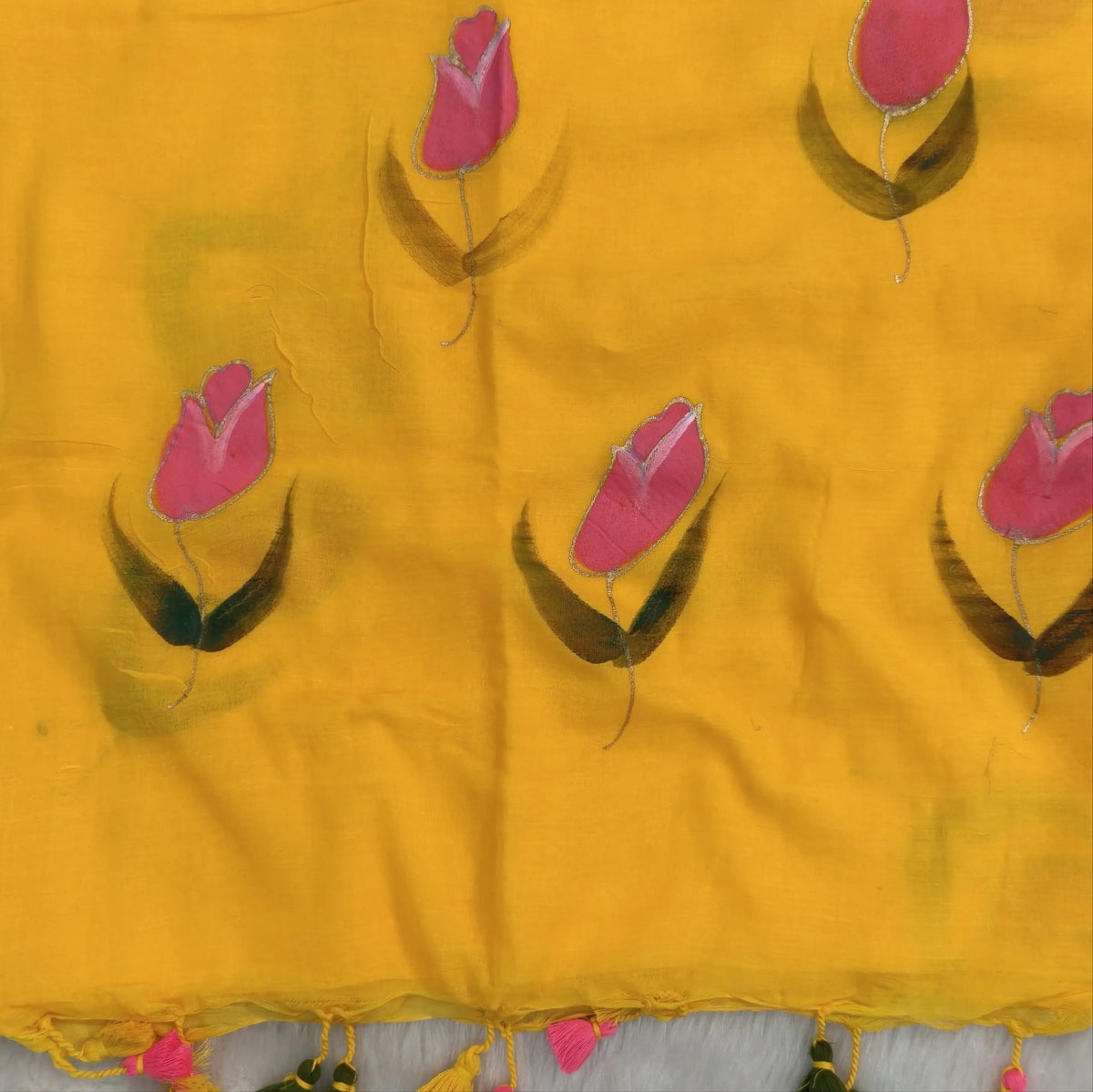 Sunshine yellow soft mul mul cotton saree(soft, light weight)with hand brush paint work all over,handmade tassles in pallu, running blouse. NS282