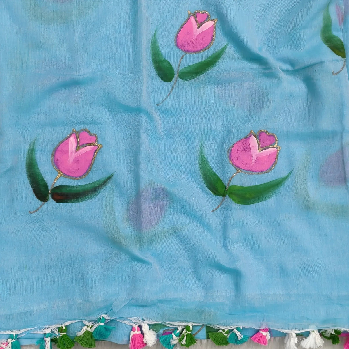 Sky blue soft mul mul cotton saree(soft, light weight)with hand brush paint work all over,handmade tassles in pallu, running blouse. NS283
