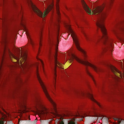 Bright red soft mul mul cotton saree(soft, light weight)with hand brush paint work all over,handmade tassles in pallu, running blouse. NS281