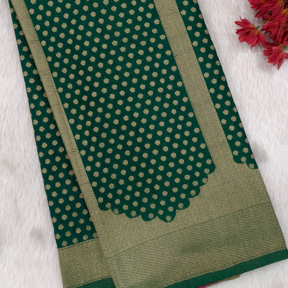 CODE WS1194 : Bottle green banarasi viscous georgette saree with antique gold zari woven buttas all over,zari woven pallu and rich zari woven pallu(lightweight)contrast rani pink blouse with zari woven buttas with borders