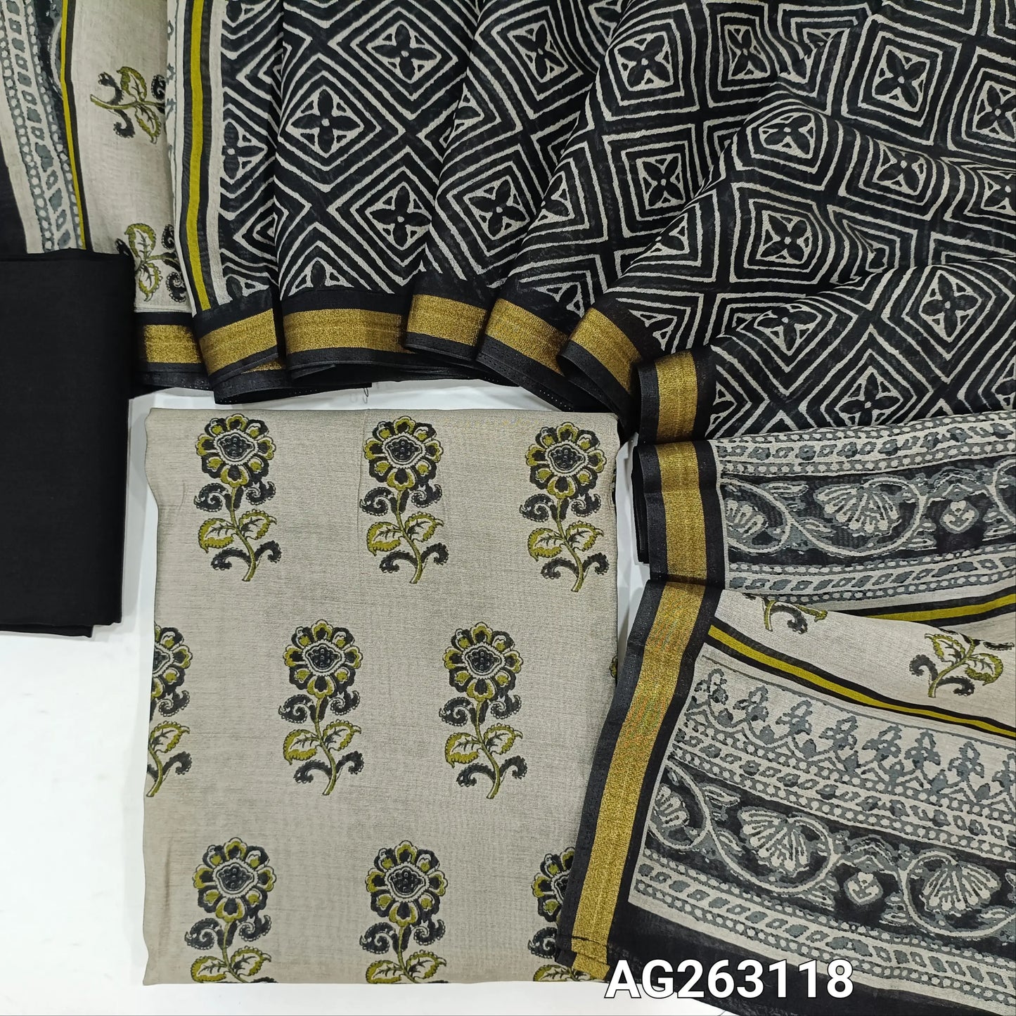 Light Silver Grey soft silk cotton unstitched salwar material, digital printed all over, tissue borders for sleeves and daman (Soft, Lining Needed), contrast black spun cotton bottom, digital printed silk cotton dupatta with borders. AG263118