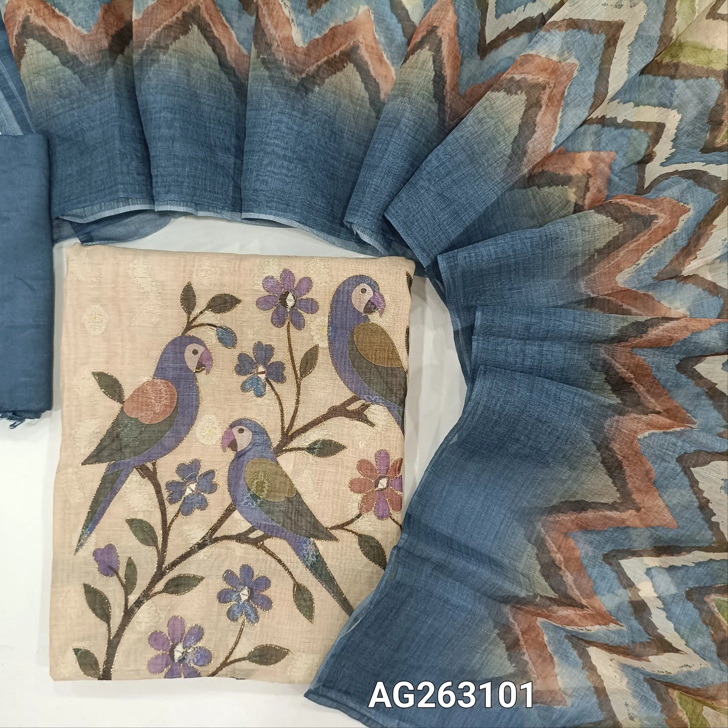 Beige and blue digital printed lightweight silk cotton unstitched salwar material, thread and silver zari woven buttas all over (Thin, Lining Needed) Matching santoon bottom, multicolored digital printed silk cotton dupatta. AG263101