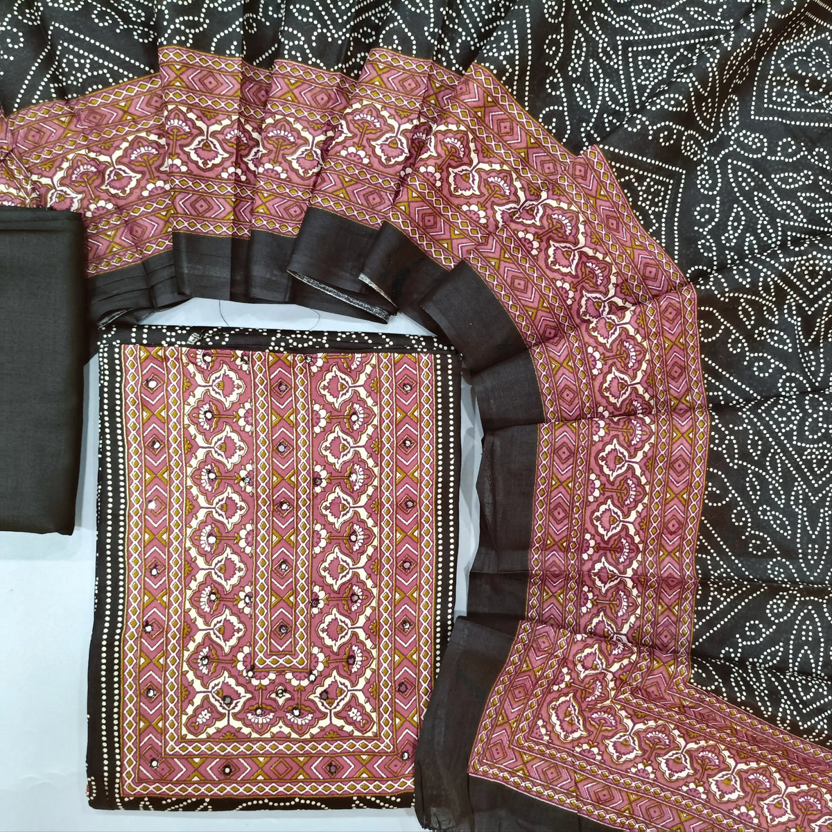 Black bandhini printed soft cotton unstitched salwar material, printed contrast yoke and daman (Lining Needed0matching spun cotton bottom, diital printed soft mul cotton dupatta. SP260629
