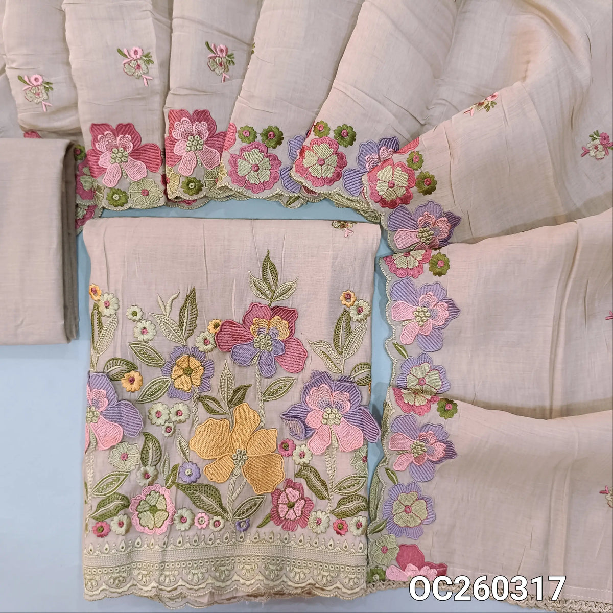 Light mauve mul chanderi unstitched salwar material,embroidery on front,floral embroidery work on daman,( soft,lining needed)cotton bottom,embroidery on  mul chanderi dupatta with floral embroidery and cut work. OC260317