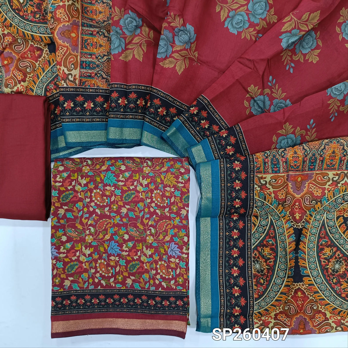 Reddish maroon floral printed soft silk cotton unstitched salwar material, tissue borders on daman (Lining Needed) Matching spun cotton bottom, digital printed soft silk cotton dupatta with borders. SP260407