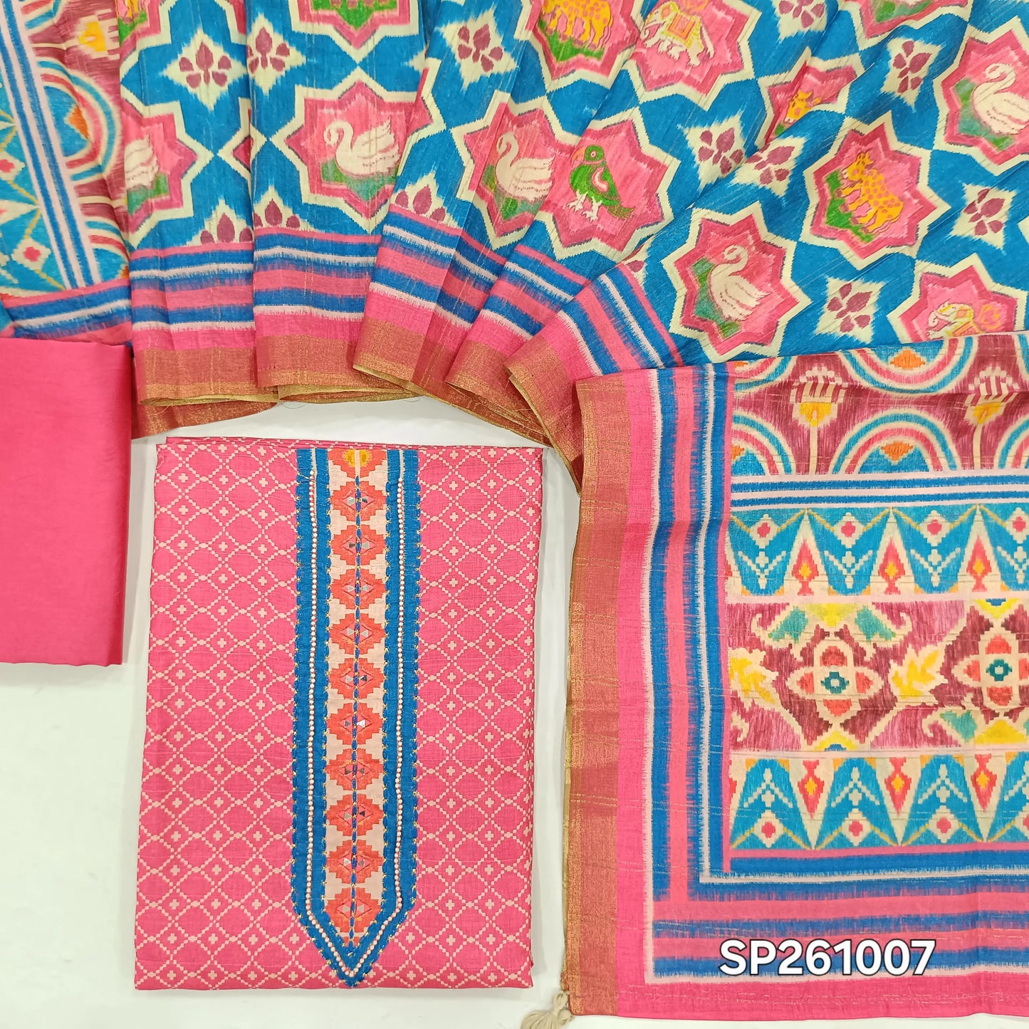 Bright pink silk cotton digital printed unstitched salwar material, real mirror work on yoke (Thin, Lining Needed)matching silky bottom, multicolored silk cotton dupatta. SP261007
