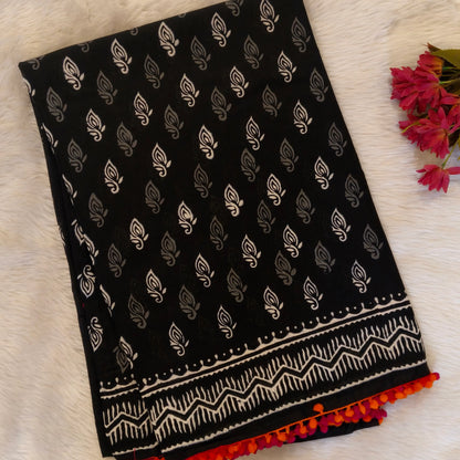 Black soft cotton printed saree with pom pom tapings (Thin, Soft)printed pallu, plain running blouse with borders. NS297