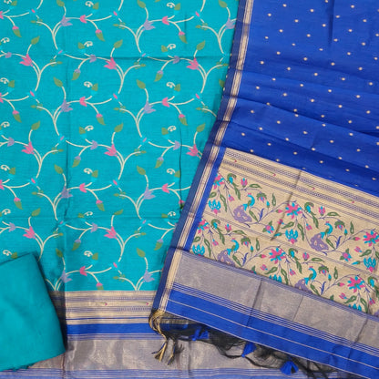 PRE ORDER SHIPPING AFTER 4 DAYS Light and dark turquoise blue premium silk cotton unstitched salwar material, rich meenakari weaving all over, paithani borders (Thin, Lining Needed) santoon bottom, meenakari weaving on silk cotton dupatta. SP261601