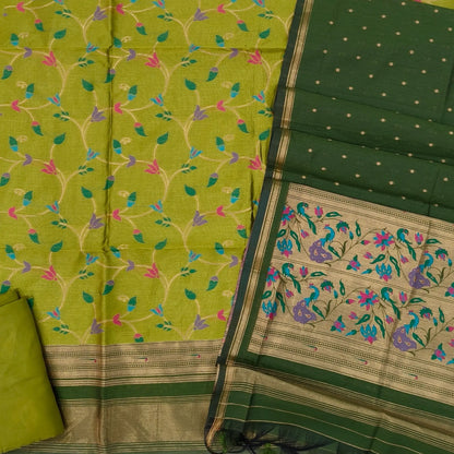 Light and dark green premium silk cotton unstitched salwar material, rich meenakari weaving all over, paithani weaving on borders (Thin, Lining Needed)matching santoon bottom, meenakari weaving on silk cotton dupatta. SP261602