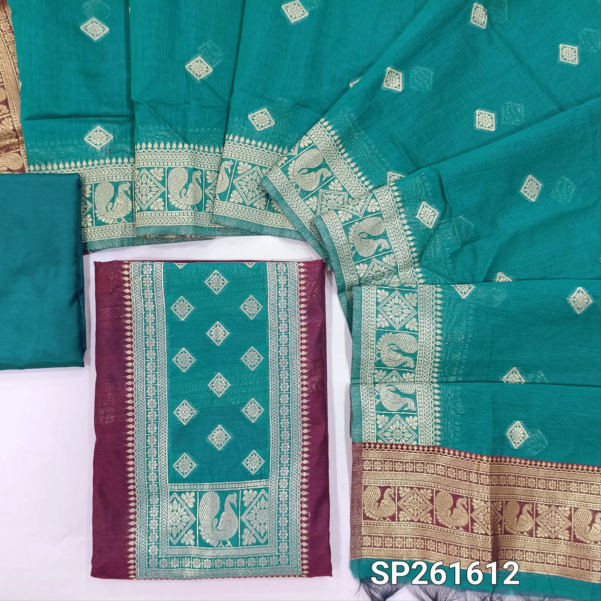 Dark maroon and teal green premium silk cotton benarasi zari woven unstitched salwar material, zari weaving on yoke&daman(Lightweight, Lining Needed)matching silk cotton bottom, zari wove silk cotton dupatta. SP261612