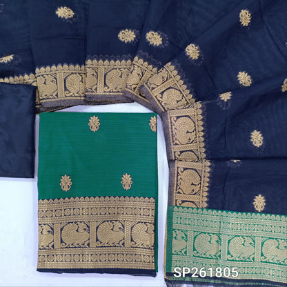 Teal blue premium silk cotton unstitched salwar material,buttas all over benarasi zari weaving daman, (lining needed)dark blue silky bottom,buttas on silk cotton dupatta with pallu and borders. SP261805