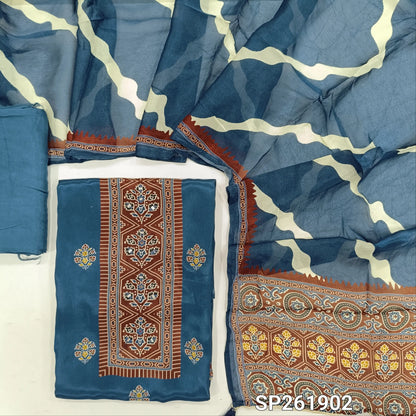 Indigo blue crepe silk unstitched salwar material, printed yoke with real mirror work, printed daman,(soft, shiny, lining needed)santoon bottom, printed short width chinon silk dupatta. SP261902