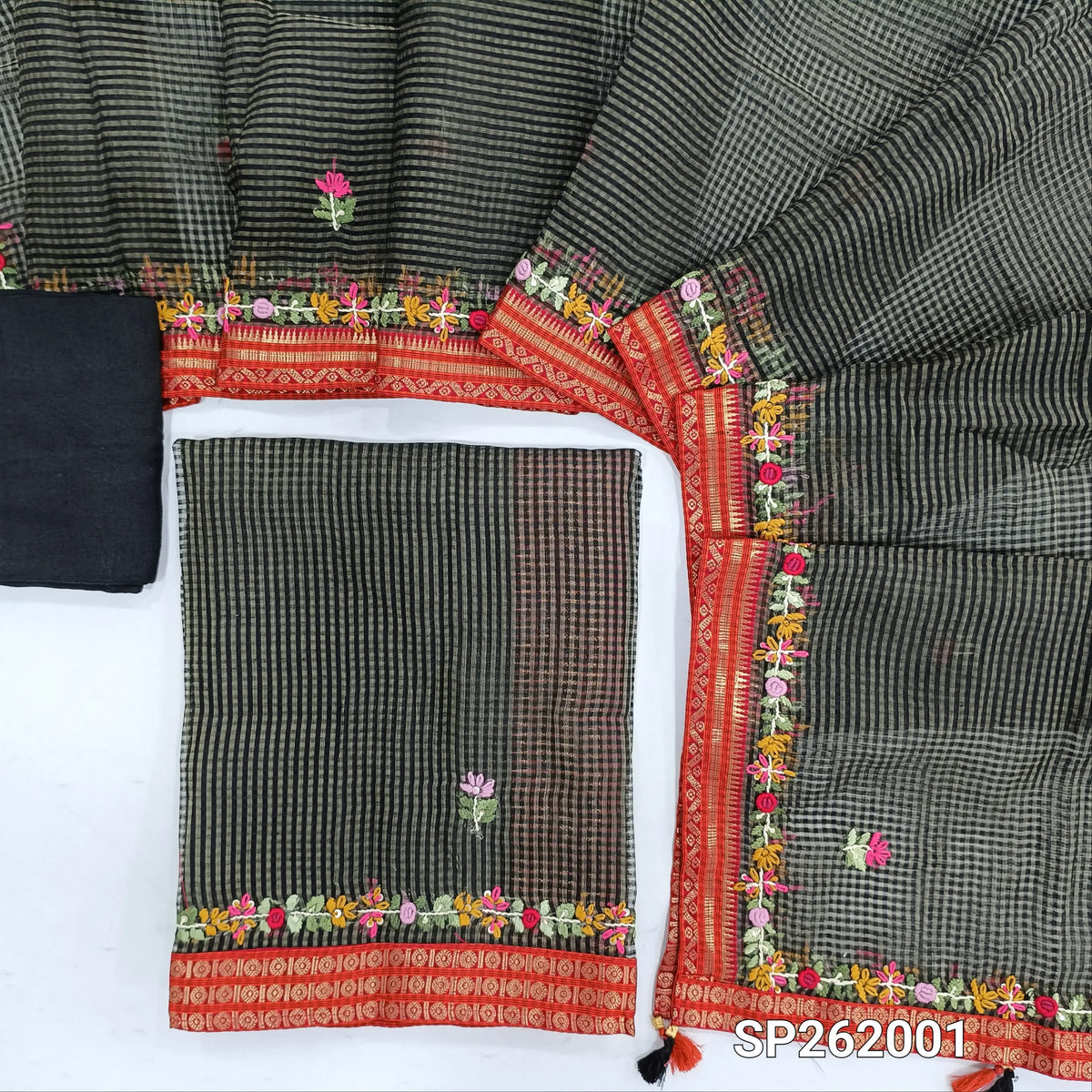 Black tissue chanderi kota unstitched salwar material,checked design & embroidery all over, zari woven and embroidery daman borders,( lining needed)santoon bottom, tissue chanderi kota dupatta with rich hand embroidery and borders. SP262001