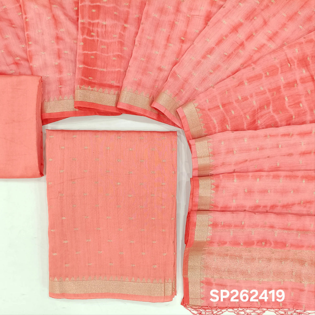 Light peachish pink premium uppada silk unstitched salwar material,zari buttas all over, (Lining Needed)premium silk bottom,buttas with shibori dyed on uppada silk dupatta with fancy tassles. SP262419