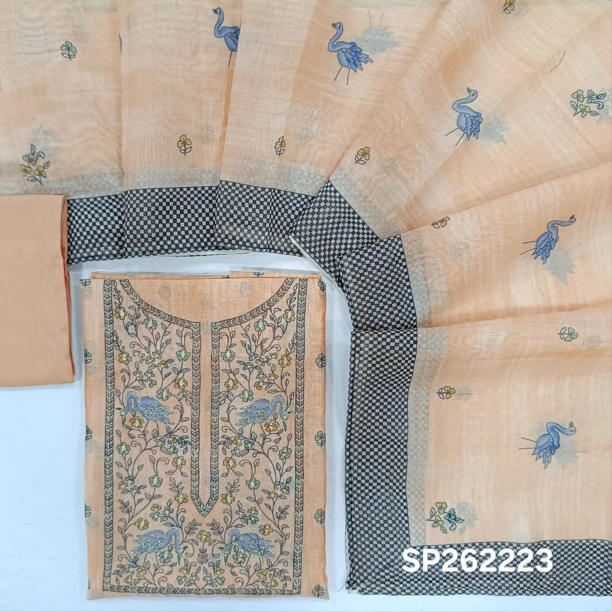 Pastel peach digital printed silk cotton unstitched salwar material,printed with zari and faux mirror work on yoke,printed daman,(lining needed)santoon bottom, digital printed silk cotton dupatta with contrast borders. SP262223