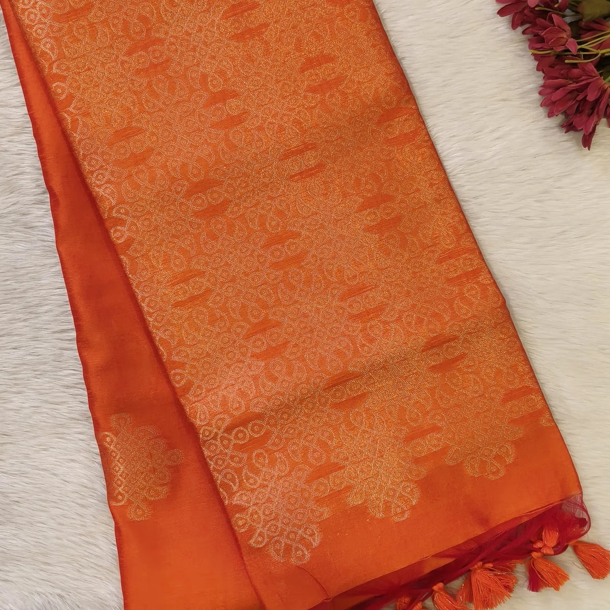 Orange semi tussar saree, with rich traditional zari weaving all over (thin, Textured) rich pallu, running blouse with zari woven buttas and borders. NS316