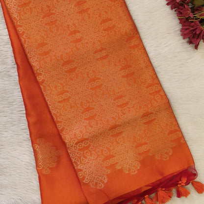 Orange semi tussar saree, with rich traditional zari weaving all over (thin, Textured) rich pallu, running blouse with zari woven buttas and borders. NS316