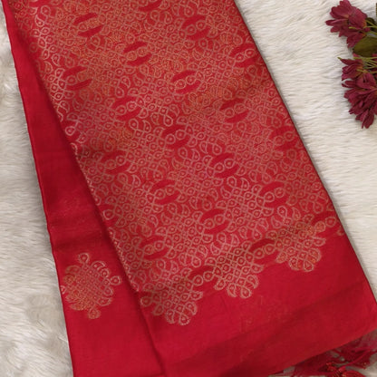 Red semi tussar saree, with rich traditional zari weaving all over (thin, Textured) rich pallu, running blouse with zari woven buttas and borders. NS311