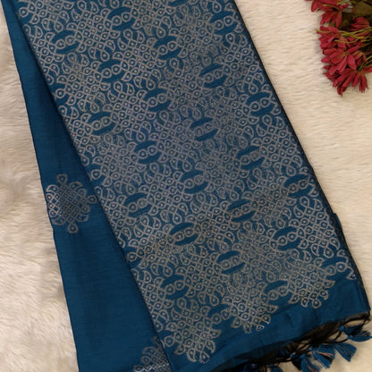 Dark turquoise blue semi tussar saree, with rich traditional zari weaving all over (thin, Textured) rich pallu, running blouse with zari woven buttas and borders. NS318