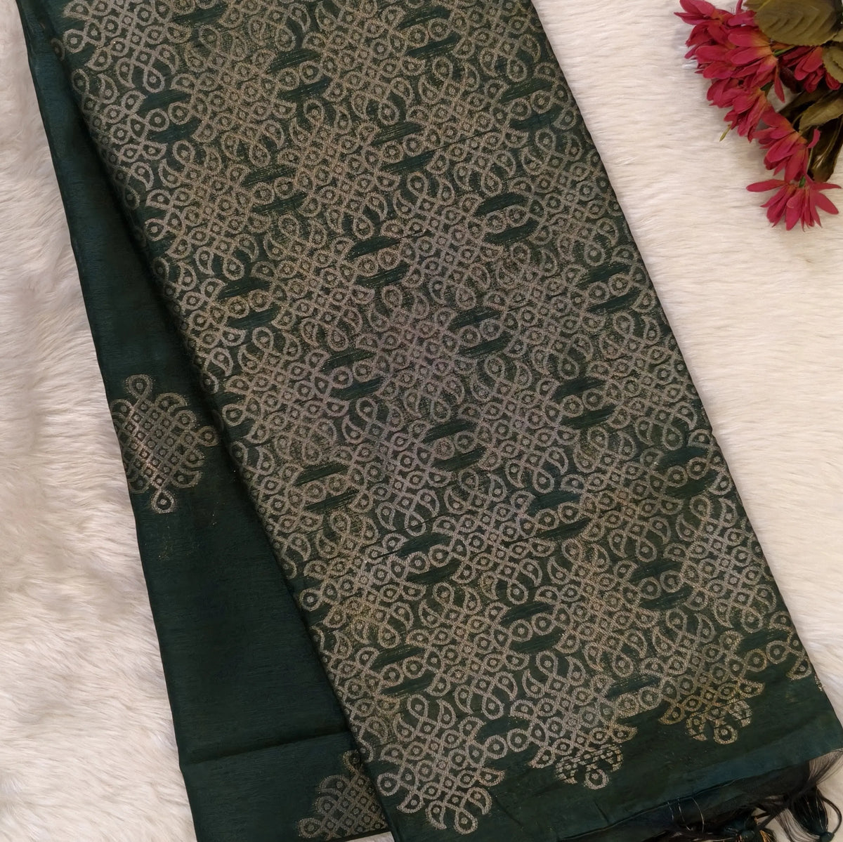 Dark green semi tussar saree, with rich traditional zari weaving all over (thin, Textured) rich pallu, running blouse with zari woven buttas and borders. NS314