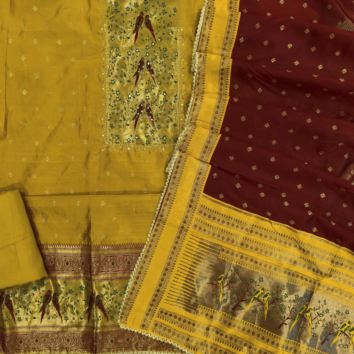 Mehandhi yellow silk cotton unstitched salwar material,rich weaving with pearl bead and sequins work on yoke,buttas on front,rich daman,(Lining Needed)spun cotton bottom, buttas on silk cotton dupatta with contrast borders & rich pallu. SP262402