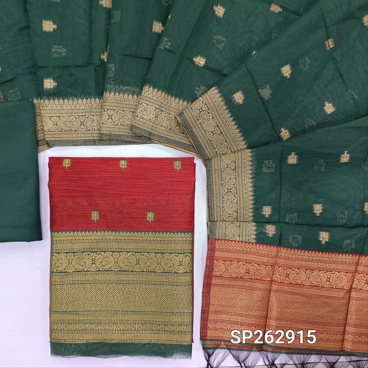 Dark maroon premium silk cotton unstitched salwar material,buttas all over benarasi zari weaving daman, (lining needed)bottle green  silky bottom,buttas on dual shaded silk cotton dupatta with rich pallu and borders. SP262915