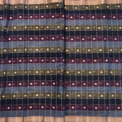 Multicoloured (Blue,purple & green)soft silk cotton saree with zari woven checks & buttas all over, zari woven double side borders, tissue pallu,multicoloured running blouse with borders & buttas. NS29