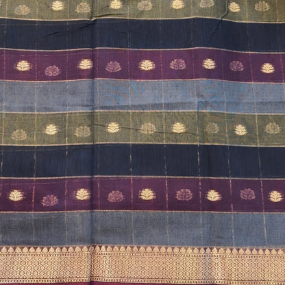 Multicoloured (Blue,purple & green)soft silk cotton saree with zari woven checks & buttas all over, zari woven double side borders, tissue pallu,multicoloured running blouse with borders & buttas. NS29