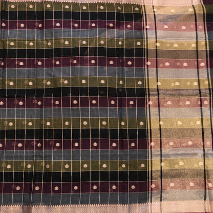 Multicoloured (Black, purple & grey)soft silk cotton saree with zari woven checks & buttas all over, zari woven double side borders, tissue pallu,multicoloured running blouse with borders & buttas. NS31