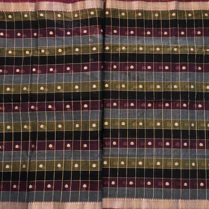 Multicoloured (Black, purple & grey)soft silk cotton saree with zari woven checks & buttas all over, zari woven double side borders, tissue pallu,multicoloured running blouse with borders & buttas. NS31