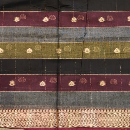 Multicoloured (Black, purple & grey)soft silk cotton saree with zari woven checks & buttas all over, zari woven double side borders, tissue pallu,multicoloured running blouse with borders & buttas. NS31