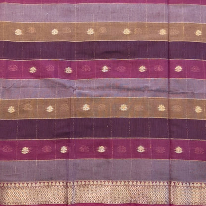 Multicoloured (Purple & maroon)soft silk cotton saree with zari woven checks & buttas all over, zari woven double side borders, tissue pallu,multicoloured running blouse with borders & buttas. NS28