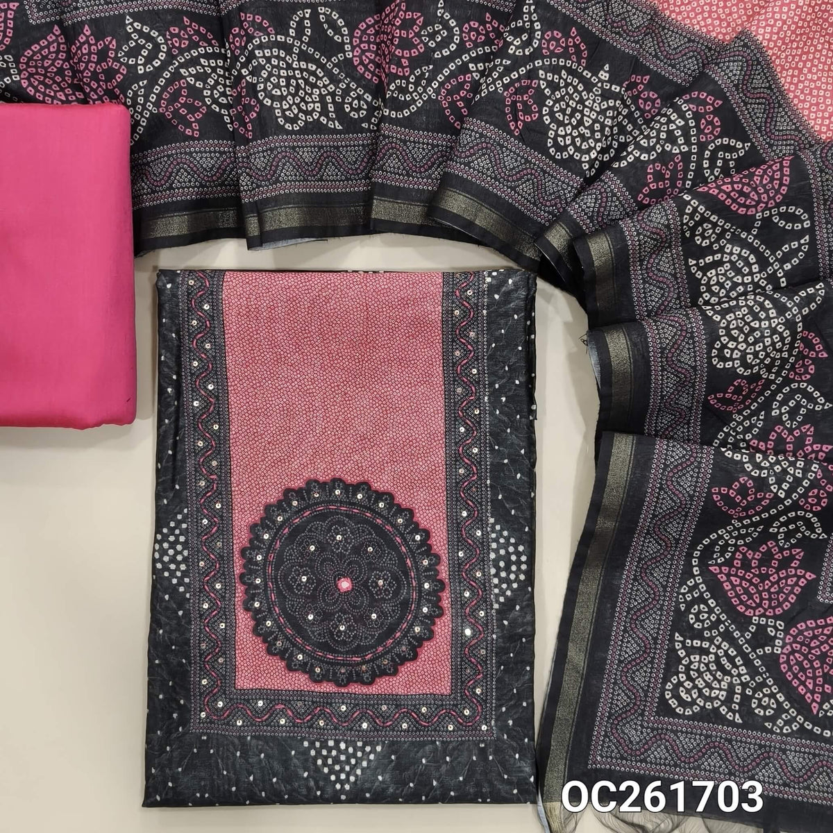 Black digital printed chanderi silk cotton unstitched salwar material, contrast printed yoke with thread work,(lining needed)pink silk cotton bottom,digital printed chanderi silk cotton dupatta with tissue borders. OC261703