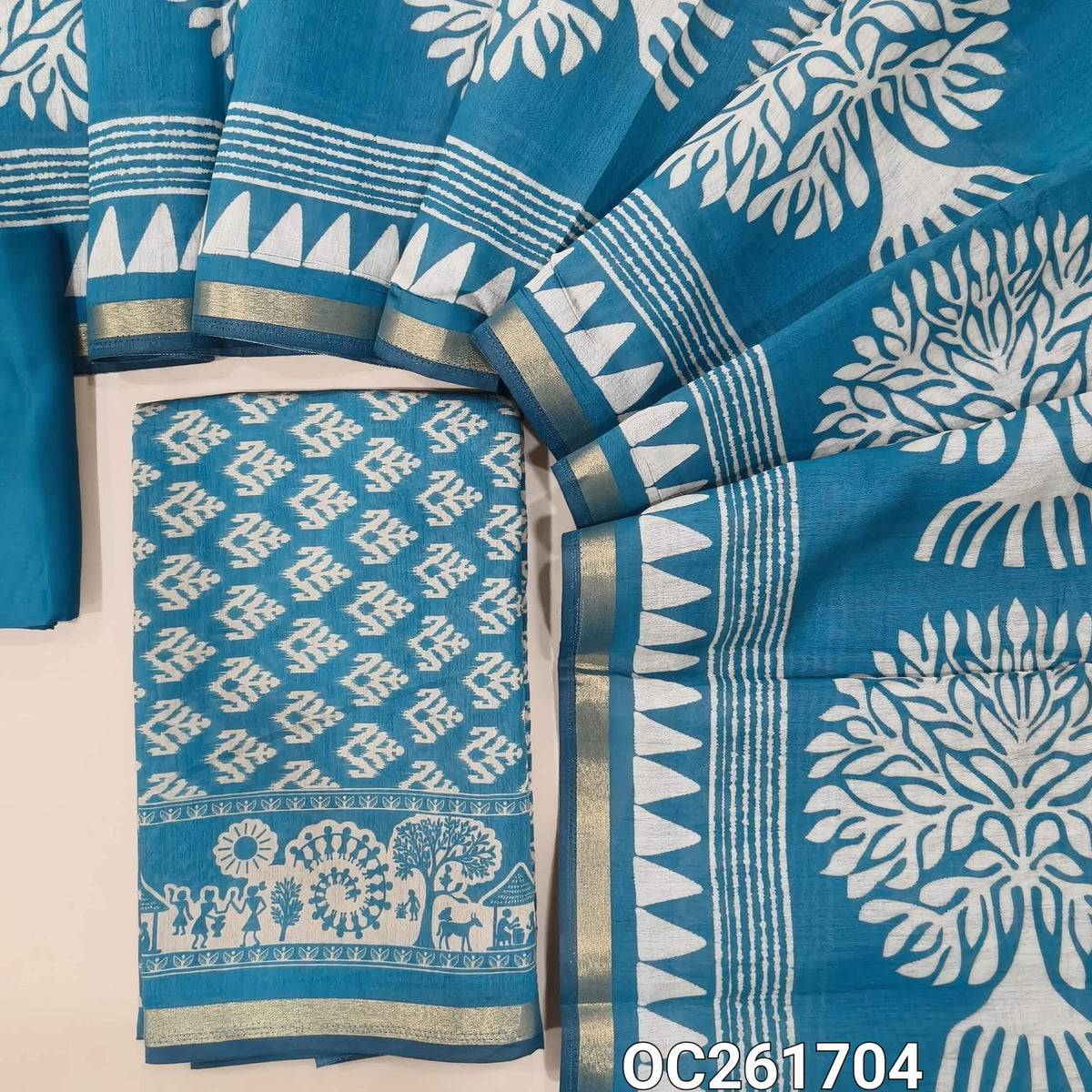 Turquoise blue silk cotton unstitched salwar material,digital printed all over,(lining needed)spun cotton bottom, tree printed full length silk cotton dupatta with tissue borders. OC261704