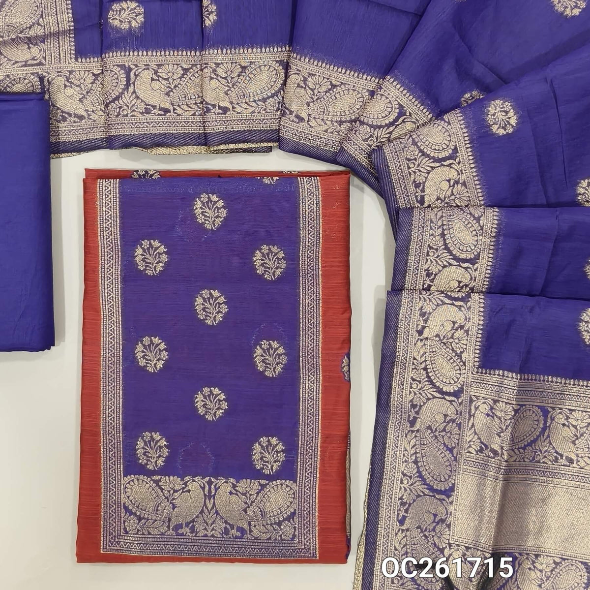 Maroon benarasi zari woven premium silk cotton unstitched salwar material,buttas on front, zari weaving on yoke, rich daman(Lightweight, Lining Needed)violet silky bottom, benarasi zari woven silk cotton dupatta with borders. OC261715