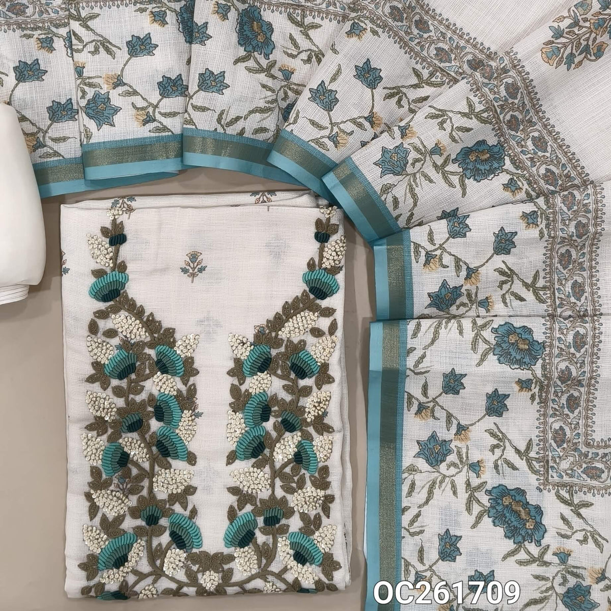 Off white premium linen salwar material, embroidery and sequins work on yoke, printed all over,(PASTEL BLUE) (textured, lining needed)spun cotton bottom, digital printed premium linen dupatta. OC261709