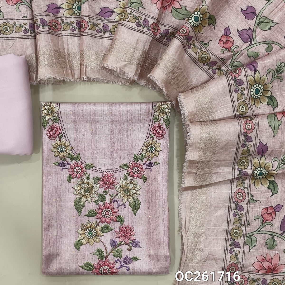 Pink semi tussar unstitched salwar material,printed yoke with sugar bead work, zari buttas all over, (lining needed)spun cotton bottom, digital printed semi tussar dupatta with zari borders. OC261716
