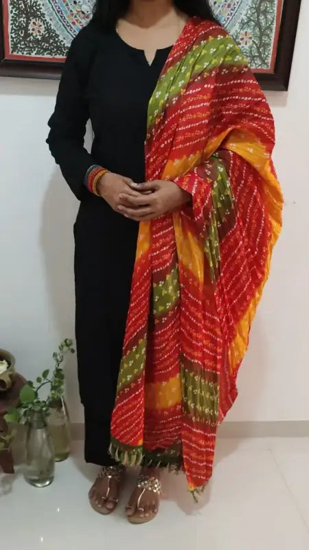 CODE DUP1: Vibrant digital printed fancy silk cotton crinkled dupatta with fancy tassels.