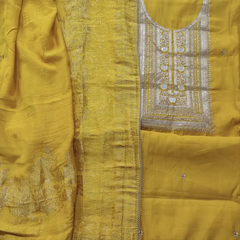 CODE FB241210: Mehandhi yellow soft silk cotton unstitched salwar material zari sequins& real mirror work on yoke(thin