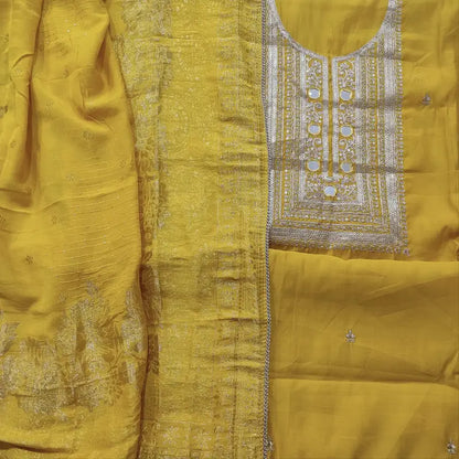 CODE FB241210: Mehandhi yellow soft silk cotton unstitched salwar material zari sequins& real mirror work on yoke(thin