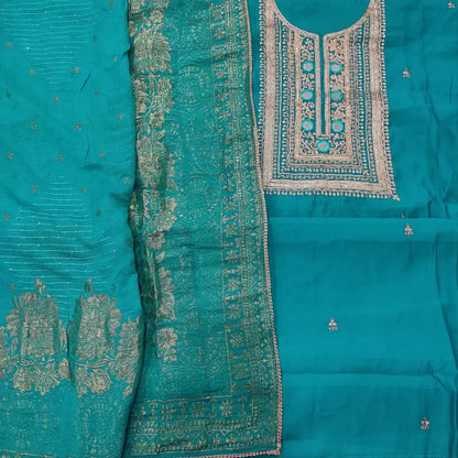 CODE FB241213: Turquoise blue soft silk cotton unstitched salwar material zari sequins& real mirror work on yoke(thin
