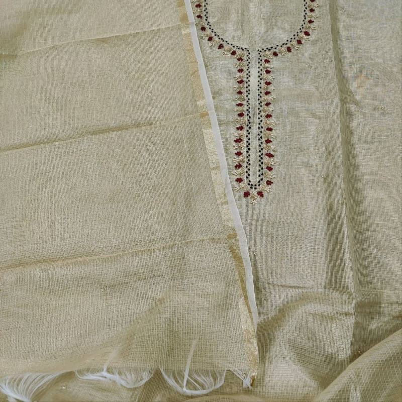 Golden beige silk salwar material fabric with decorative embroidered neckline detail