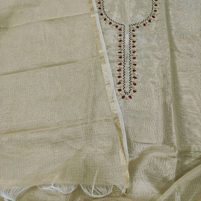 Golden beige silk salwar material fabric with decorative embroidered neckline detail