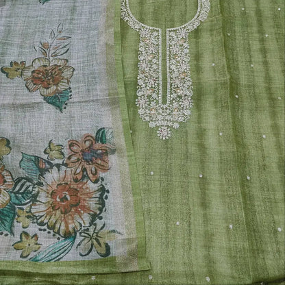 Traditional embroidered fabric with floral print and white neckline design on olive green salwar material